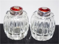 Pair Neka Denmark silver capped pepper shakers