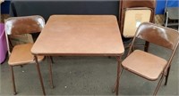 Brown Card Table with 4 Folding Chairs