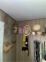 large lot of baskets on rope and wall