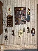 wall of trinkets, shelves & pic