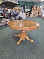 OAK ROUND CLAW FOOT DINING TABLE, TOP HAS SOME