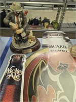 Metal advertising signs and figurines as shown