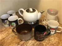 Coffee cups, teapot, grinder