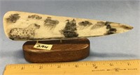 7 1/2" fossilized ivory tusk, scrimmed with a naut