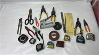 Tape measure wire cutters and tools a lot