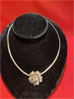 Sterling silver necklace with flower attached to