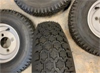 LOT OF 4 NEW TIRES WITH RIMS