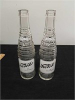 Two vintage nesbitts soda bottles