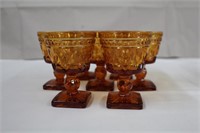 Seven Indiana Glass amber goblets, 4"H
