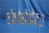 Collection of milk and cream bottles