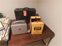 Lot 211  Brownie 500 Projector and suit cases.