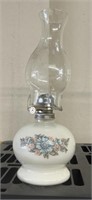 Floral themed oil lamp