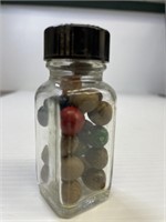 small jar of small clay marbles