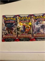 3 sealed Pokémon card packs