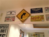 all license plates and signs on wall