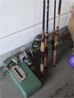 4 fishing poles shows wear, tackle box and pole