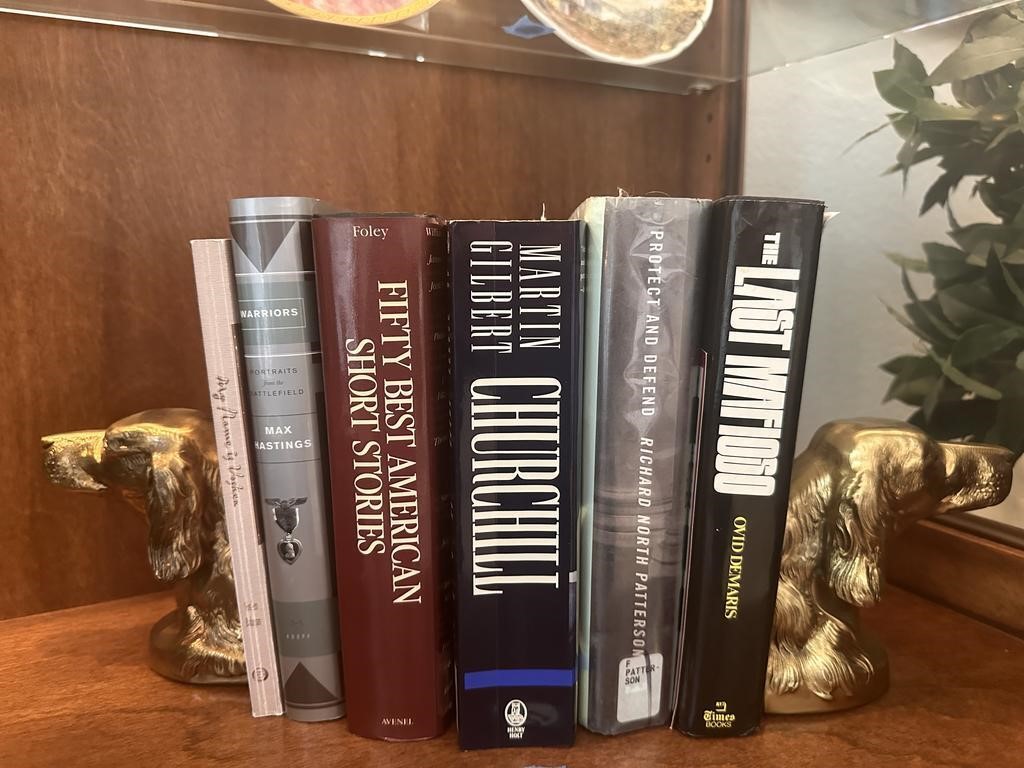 BOOKS AND BRASS BOOKENDS