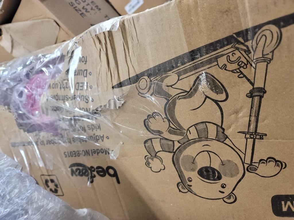 Believe pink scooter. Damaged box