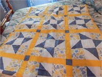 Homemade blue and yellow quilt