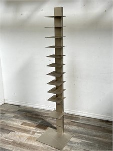 Post-modern metal "spine tower" floating bookshelf
