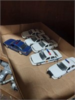 6 metal police cars