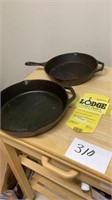 2 lodge cast-iron skillets, a 12 and a 10 inch,