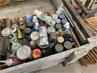 tray full of spray cans, paint/lubricant etc.