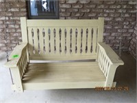 Wooden porch swing