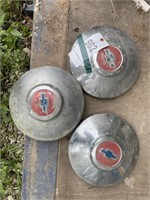 3 Chevy hub caps