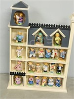 22 porcelain figurines w/ wood display rack