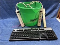 HP keyboard & surge protectors in bucket