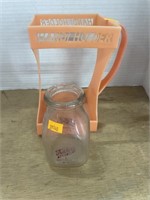 Vintage thatchers milk bottle and handle holder