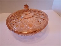 Pink depression glass candy dish with lid.