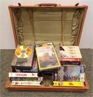 GROUP OF VHS TAPES IN OLDER SUITCASE