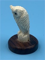 Moose antler carved owl, 2" tall with hardwood bas