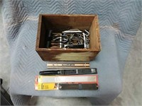 box of sanders, hooks, hand saws