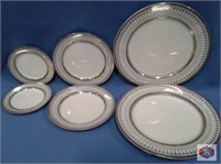 Gothic silver chargers (289) + salad plates (334)