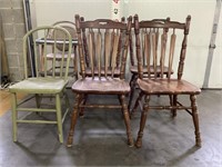 Set of 4 wooden chairs. Have scratches and one
