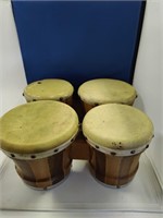 2 Sets of bongo drums.