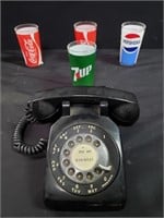 Group of vintage tumblers and Rotary telephone