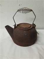 Vintage cast iron teapot
