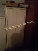 Metal cabinet with contents