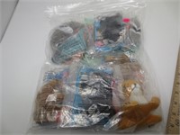 10 small stuffed toys in sealed bags