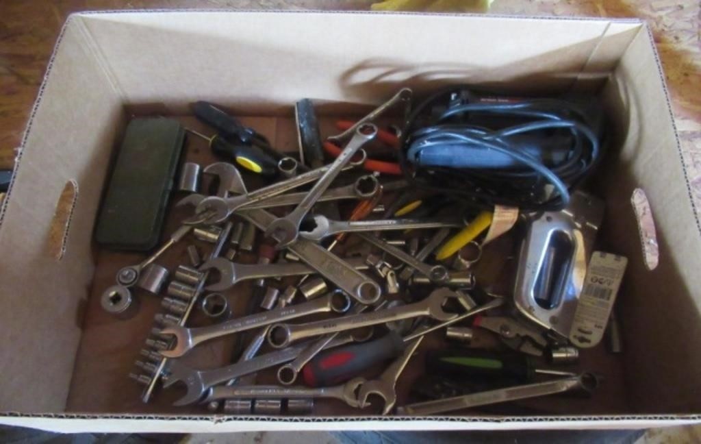 Combination wrenches, staplers, hand tools.