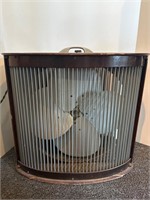 Antique Mathes three speed fan in cabinet