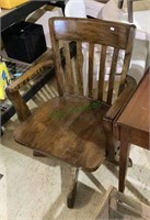 Vintage solid wood executive swivel armchair