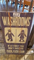wooden washroom sign