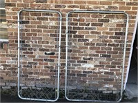 Chain link gates. The wider one has wire damage