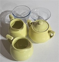 2 creamers,  sugar bowl  and  small bowls