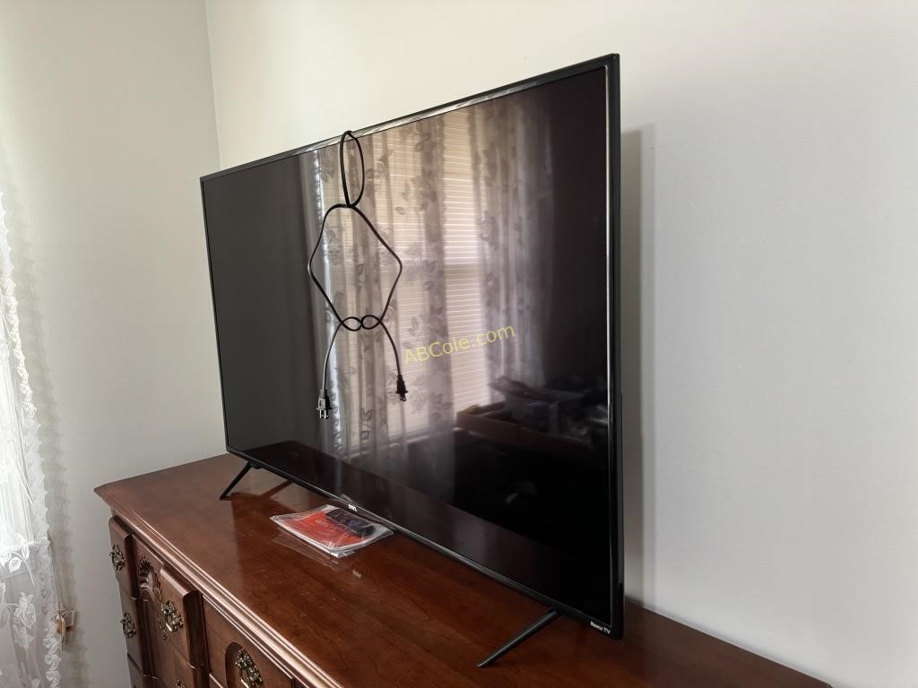 ONN 55" Roku TV on Stand with Remote and quick